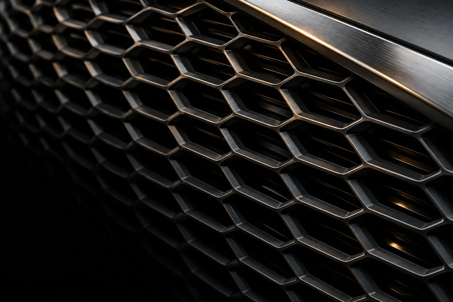 Conceptual close-up of graphite automotive grille mesh